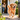 Golden Retriever wearing a PawView dog harness and smart pet ID tag near an open gate